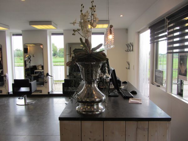 Kapsalon foto van kniploods 43